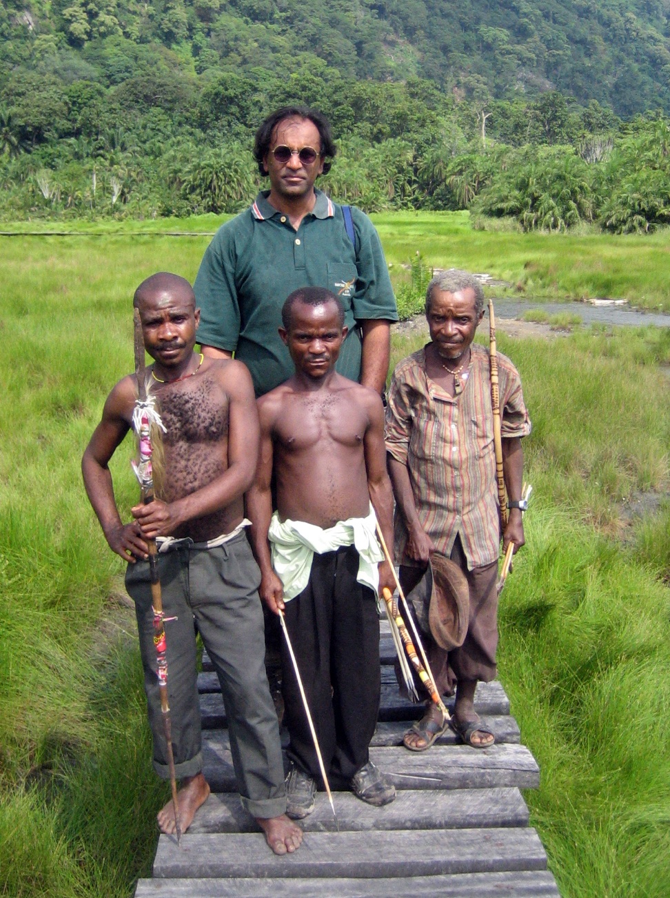 Hitesh with Batwa, a pygmy tribe, in Uganda.