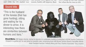 The medium is the message, as Hitesh dons a gorilla suit to communicate the need for rainforest conservation.