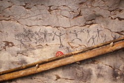 Charcoal cave drawings on festivals and funerals.