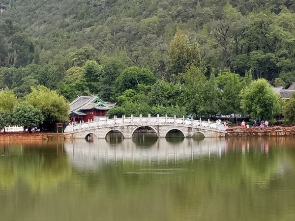 Bridge at the picturesque Heilongtan Park in Lijiang of Yunnan Province