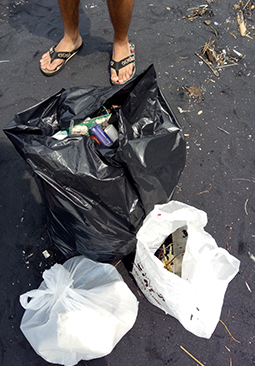 Rubbish picked up from the beach at Berawa, near Canggu, and bagged.
