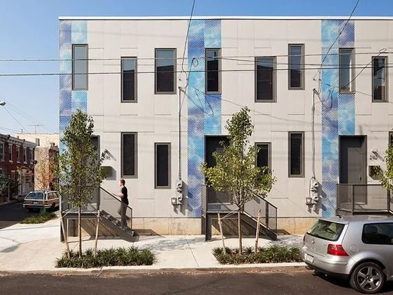 Postgreen Homes' "Skinny Project" consists of 3 LEED Platinum Homes that can be built on lots as narrow as 13 feet, but which developers say still has an open and roomy feel. Photo credit: Postgreen Homes.