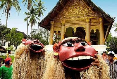 Pimai Lao sees ancient animist business as well as modern Buddhist celebrations. Courtesy Lao Tourism.