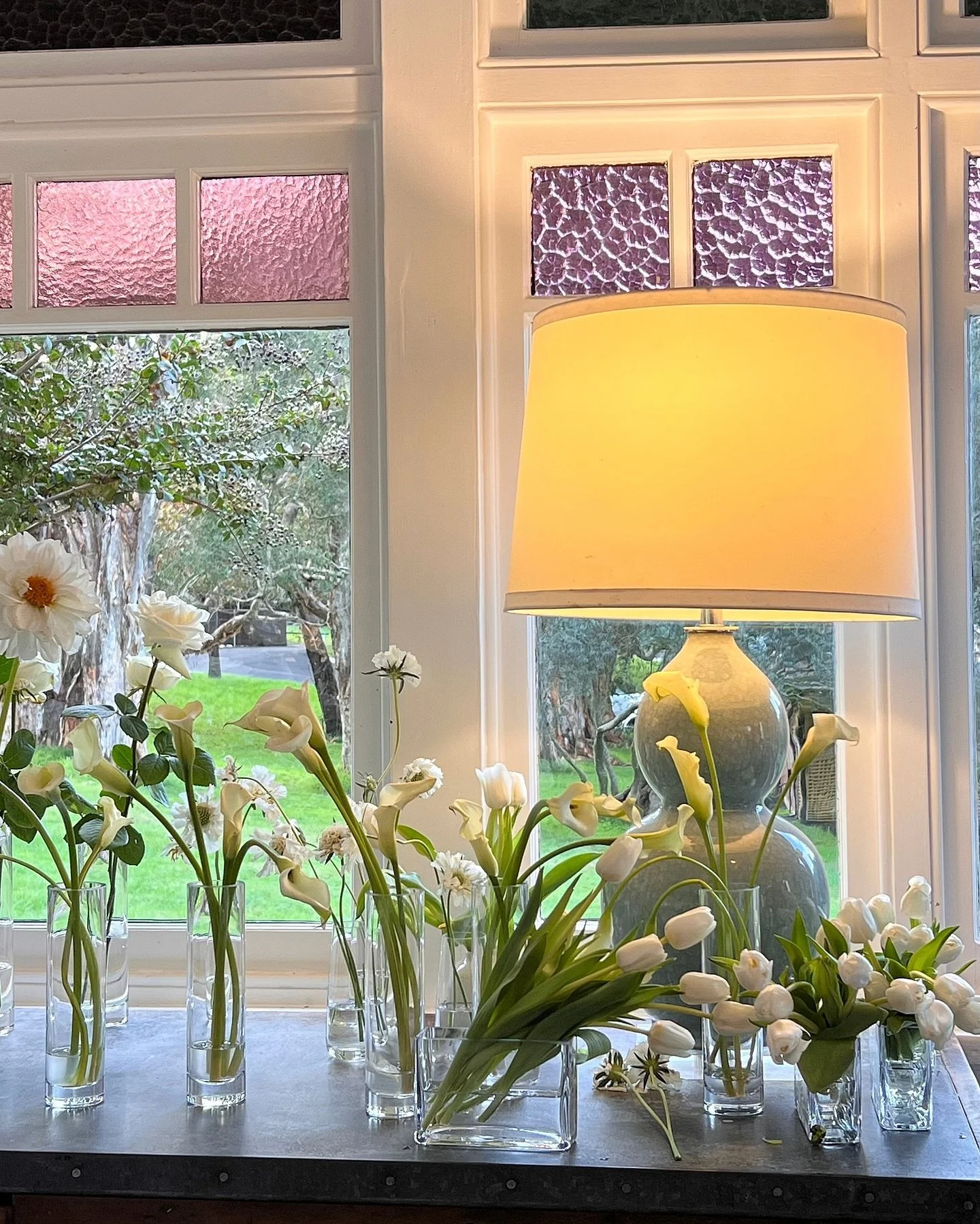 That quiet moment before the magic &mdash; bud vases lined up, ready to turn dinner tables into something a little dreamy 🤍✨