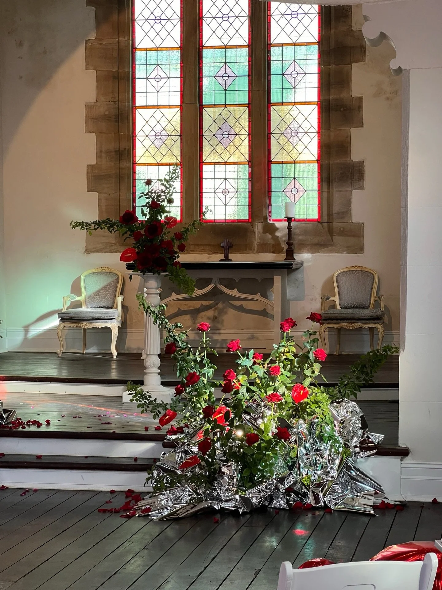 Red roses reaching, silver shimmer shining, stained glass flexing&hellip;and just like that, a sacred space became a stage for the beginning of the rest of their lives ❤️&zwj;🔥

📍 @lordsestatesydney 
📸 @hiddenlens.au 
💍 @celebrant_beverly 
❤️&zwj