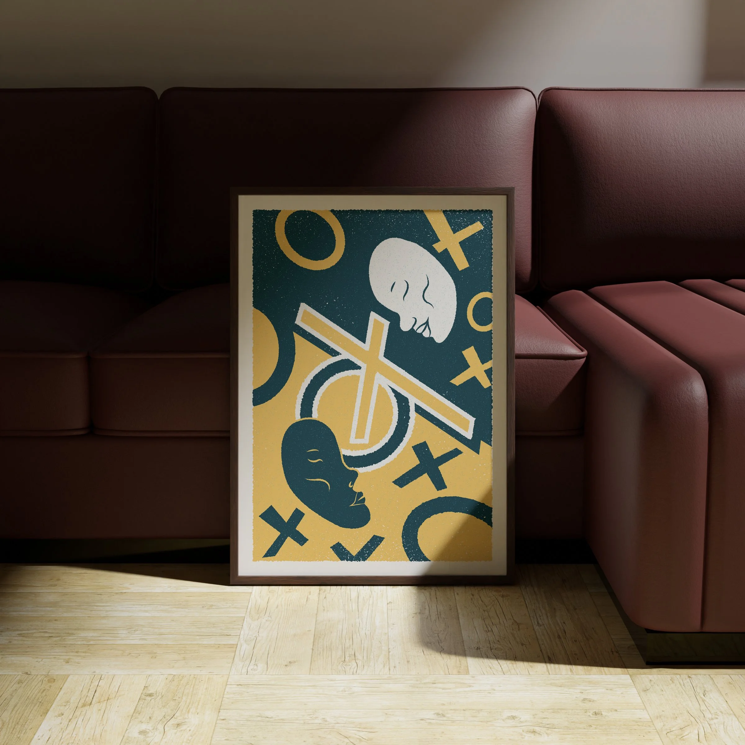 The Dividing Line - Two Faces Art Print, shown in a dark frame above a warm sofa. Print supplied unframed.