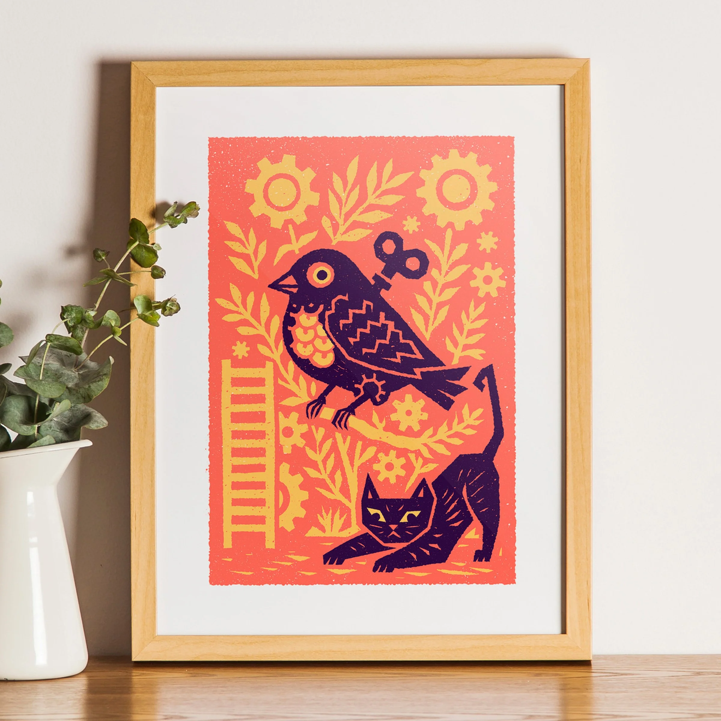 A Slipped Mechanism - Wind-Up Bird Art Print, shown in a oak frame above an oak cabinet. Print supplied unframed.