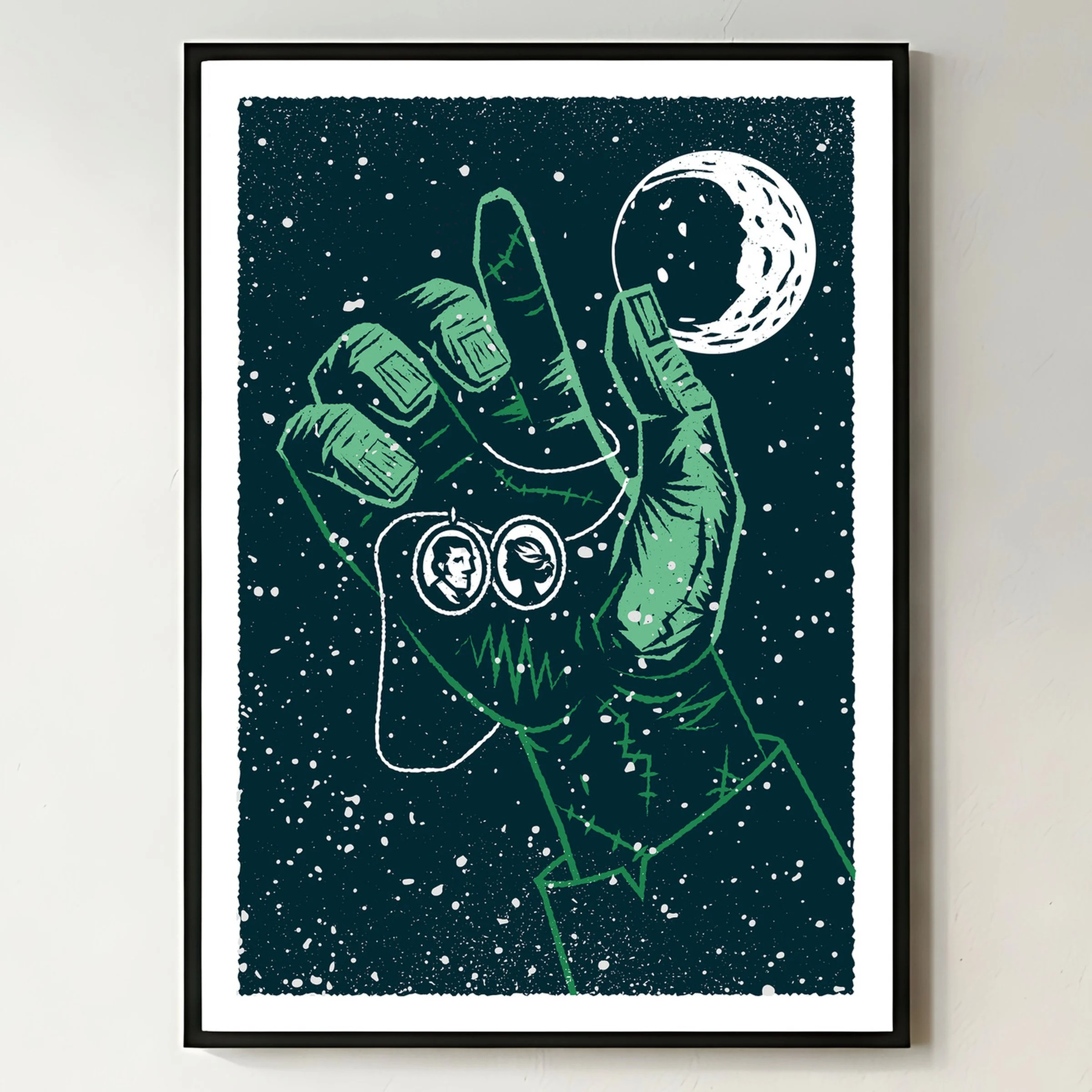 The Spark - Frankenstein Art Print, shown in a black frame on a bright wall. Print supplied unframed.