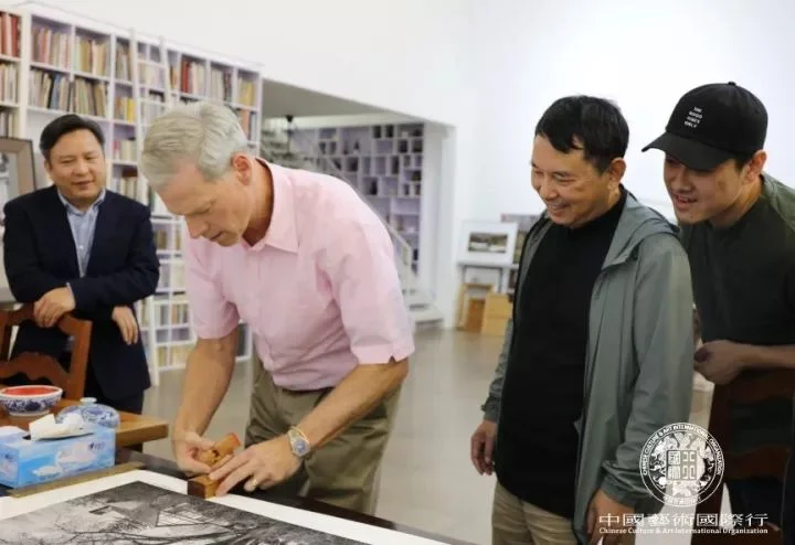 Mr. Steven C. Rockefeller Jr. signed and stamped on his photography work to Mr. Jiang Guofang