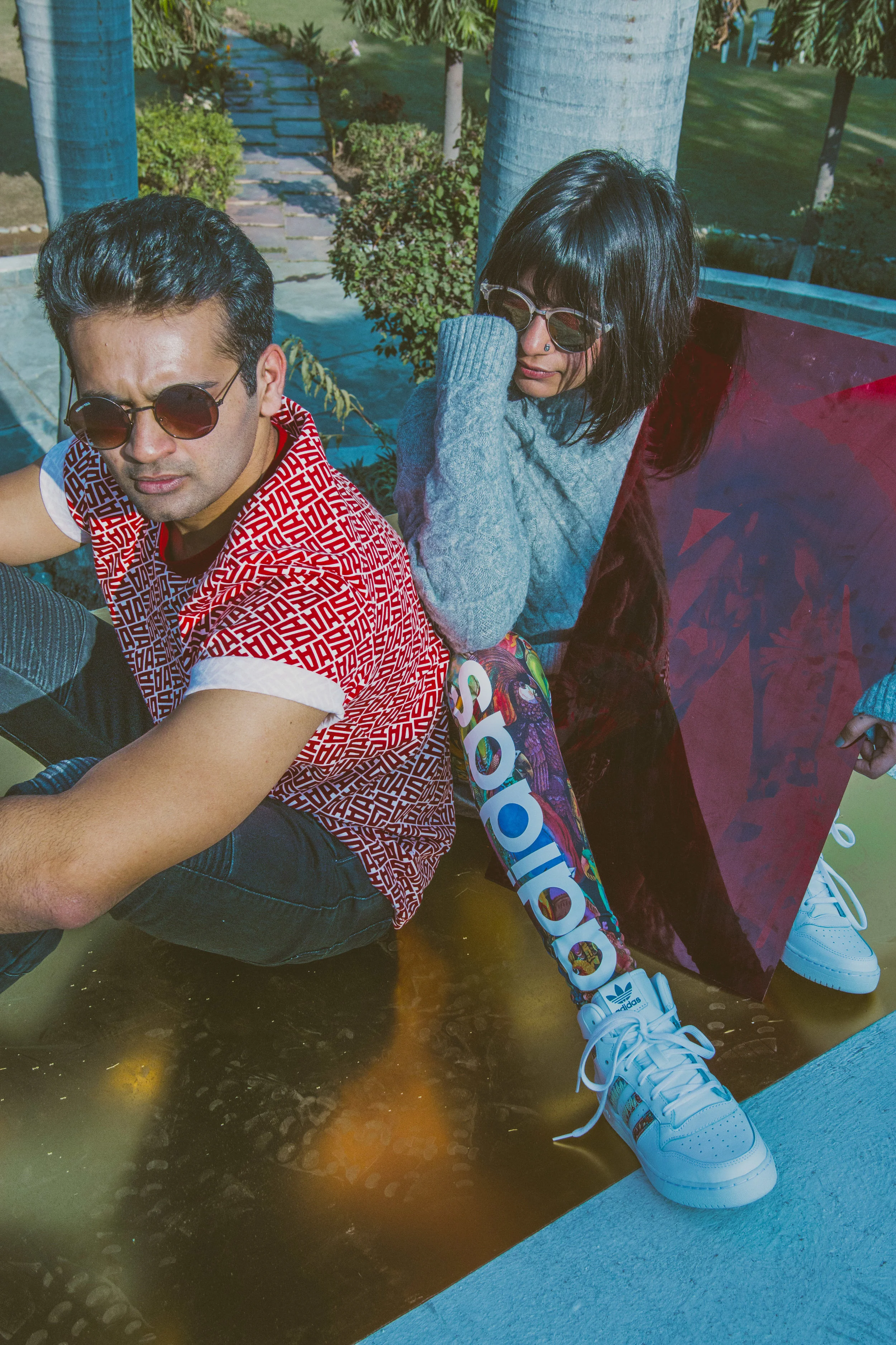 Madhur wearing t-shirt by Adidas Originals & lowers by Celio. Priyanka is wearing a sweater top by HnM, lowers and shoes by Adidas Originals & glasses by Opium