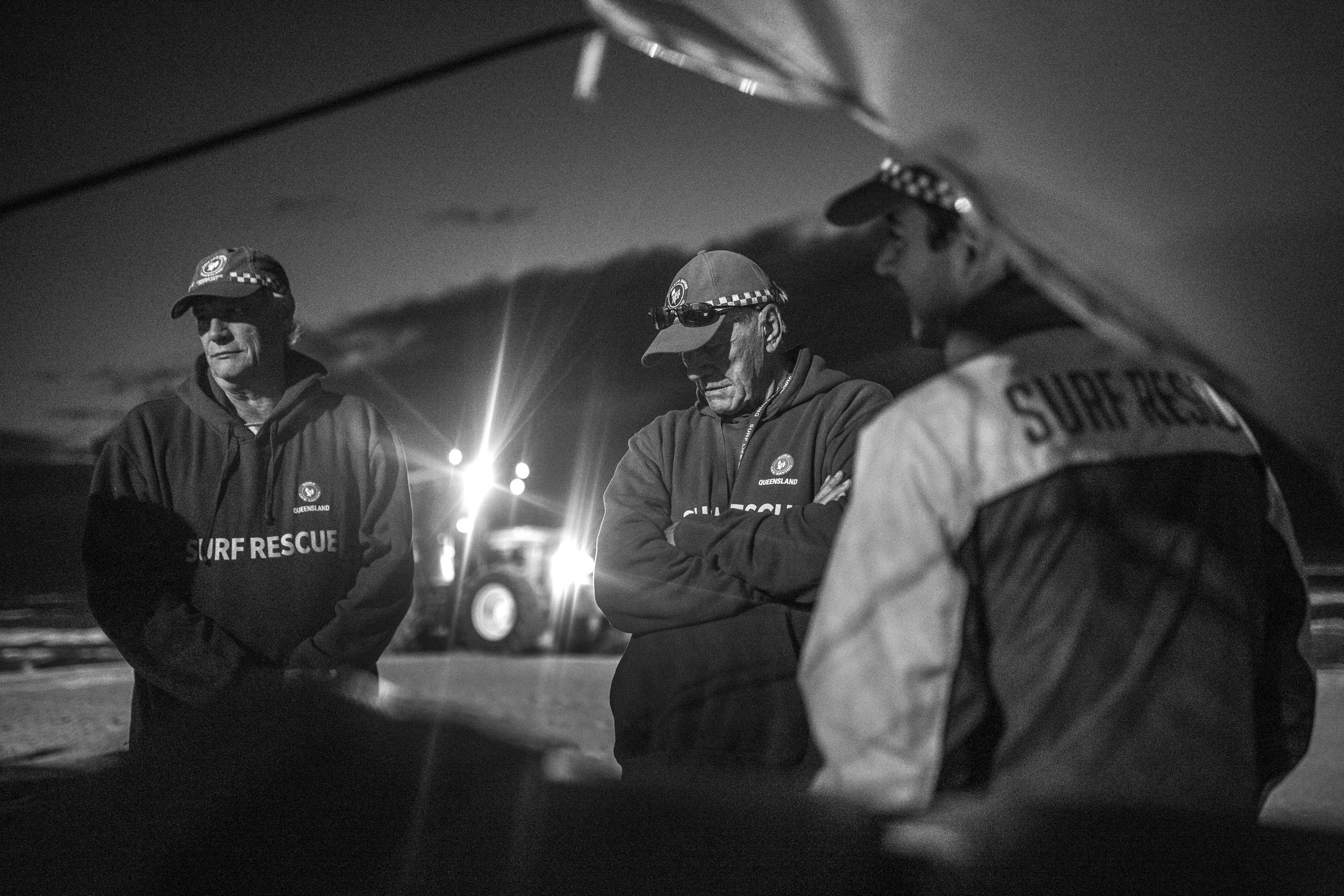 Whilst the Life Guard season has a slight pause during the winter seasons, the Dawn Patrol never rest. 365 days a year, every year, the volunteers arise at 4:30am in harsh conditions to connect and monitor the activity on the beach. Here, the volunteers pause to debrief the day, whilst the early morning Beach Tractor smooths the sand and the sun continues to hide behind the horizon. Having just had Cyclone Debbie pass the Queensland Coast, the air temperature had dropped to just 15 degrees at the seaway. The Dawn Patrol arrived rugged up in their winter uniforms, despite it being April.