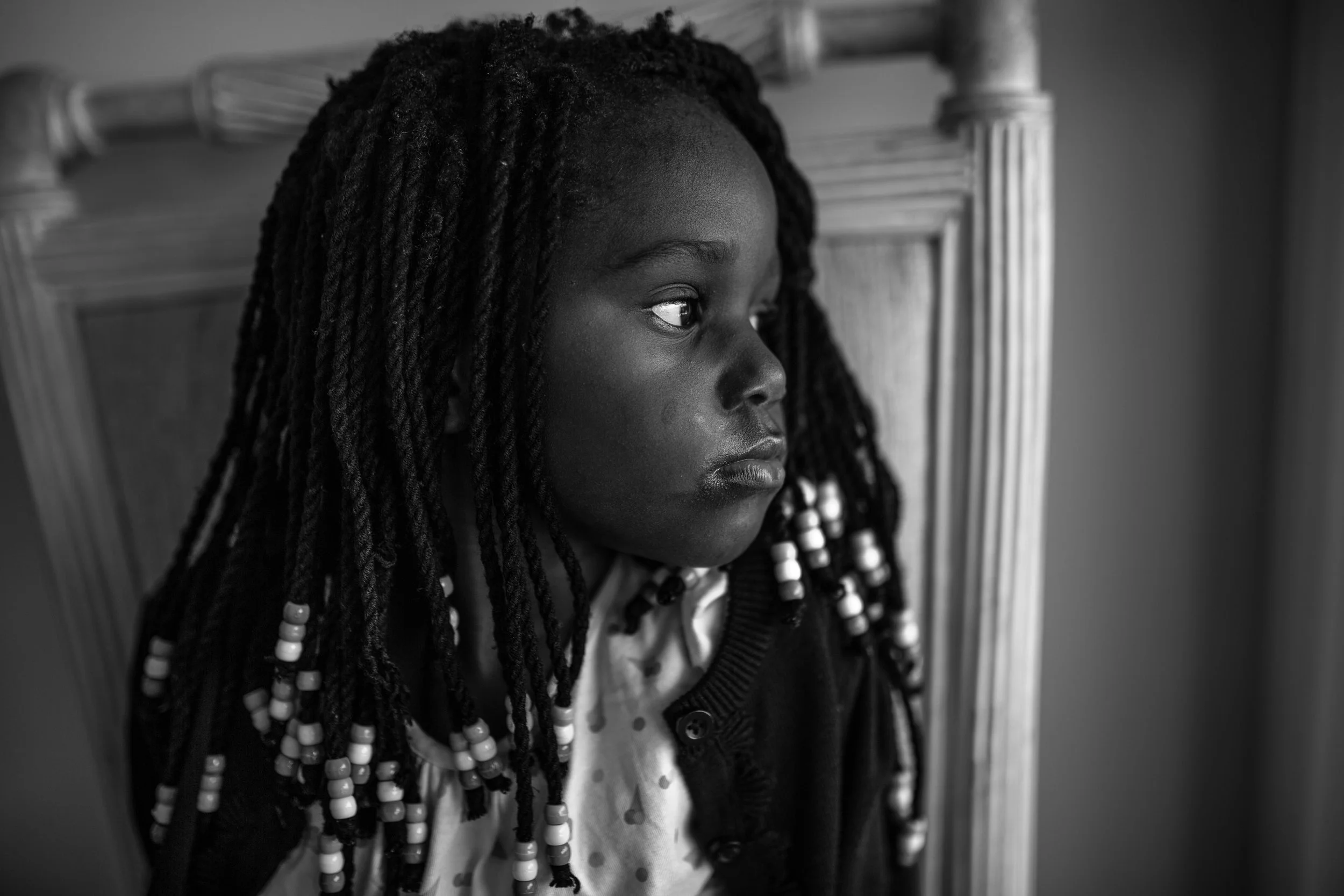 Trishelle met baby Hope 4 months after the move to Uganda. Alerted by locals, Trishelle arrived to find 25 children living in cages, with Hope being one of four babies. She was 8 weeks old when Trishelle found her, laying in her own filth, with a case worker doing nothin to assist. She soon discovered that Hope was born on the side of a busy high way, to a mentally ill woman who survived on scraps and her own filth. The Mother soon passed away after being hit by a car. Hope’s certificate reads, 'Mother unknown and Father unknown.’ Soon after, Trishelle came back to rescue Hope after she was kidnapped for child sacrifice in the marketplace. Whilst the practice is illegal, it is still heavily practiced in Uganda, said to bring fame and fortune to those who sacrifice children. IN 2017, Hope is 3 years old (seen in photograph). She speaks as fluently as a 7 year old child, and has hit every developmental milestone ahead of her time.