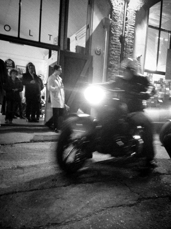 Bike being ridden outside Bold Motorcycles London.