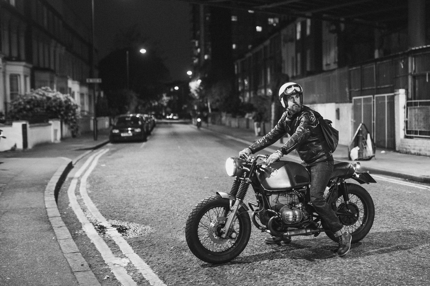 Motorcycle being ridden outside Bolt Motorcycles London.