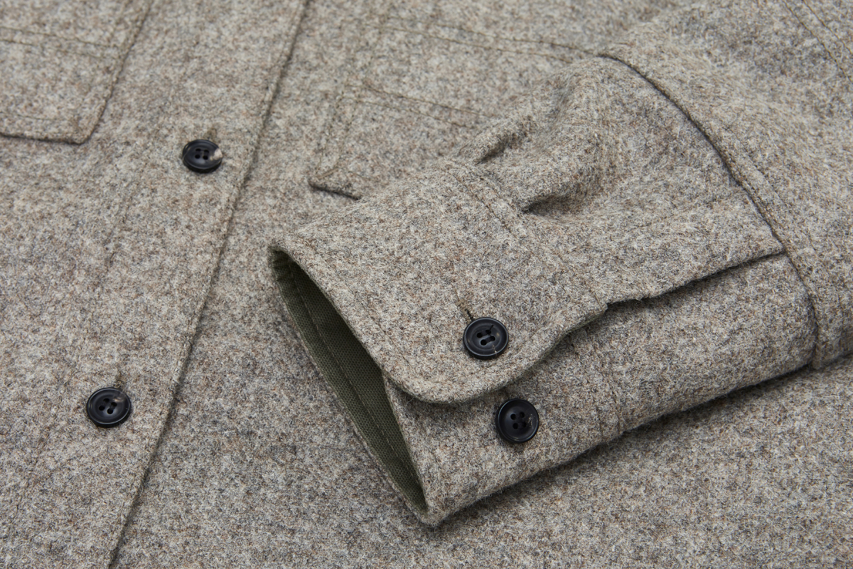 Cuffs can be tightened. Cuts wind chill.