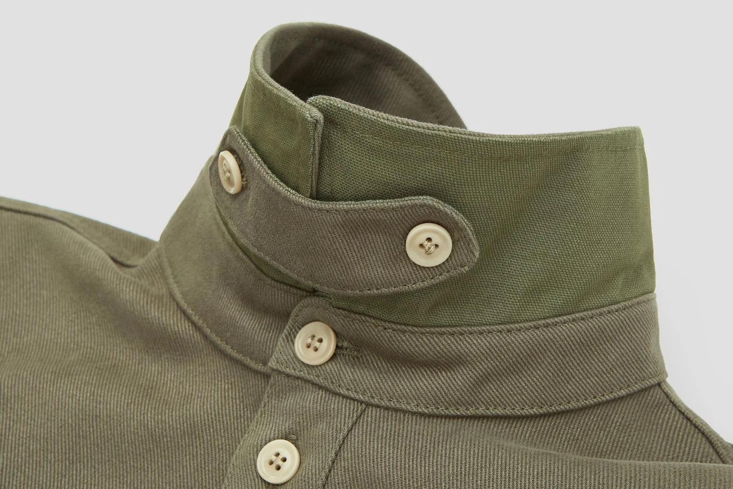 A removable collar-tab closes neck. Ideal for cold days + long rides.