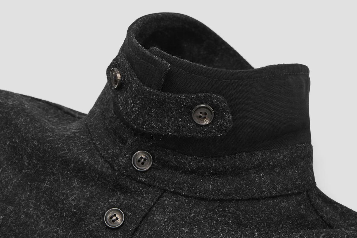 A removable collar-tab closes neck. Ideal for cold days + long rides.