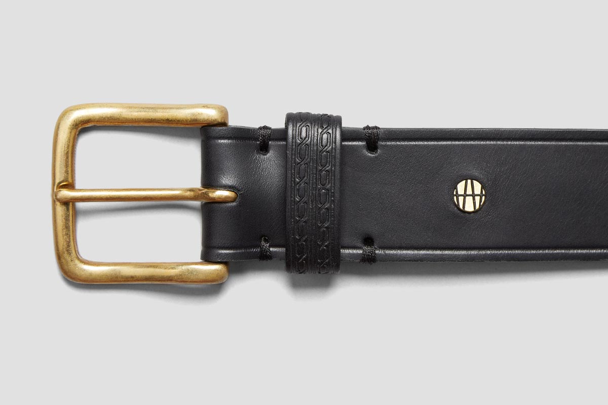 Brass Buckle. Embossed belt loop. Made in London.