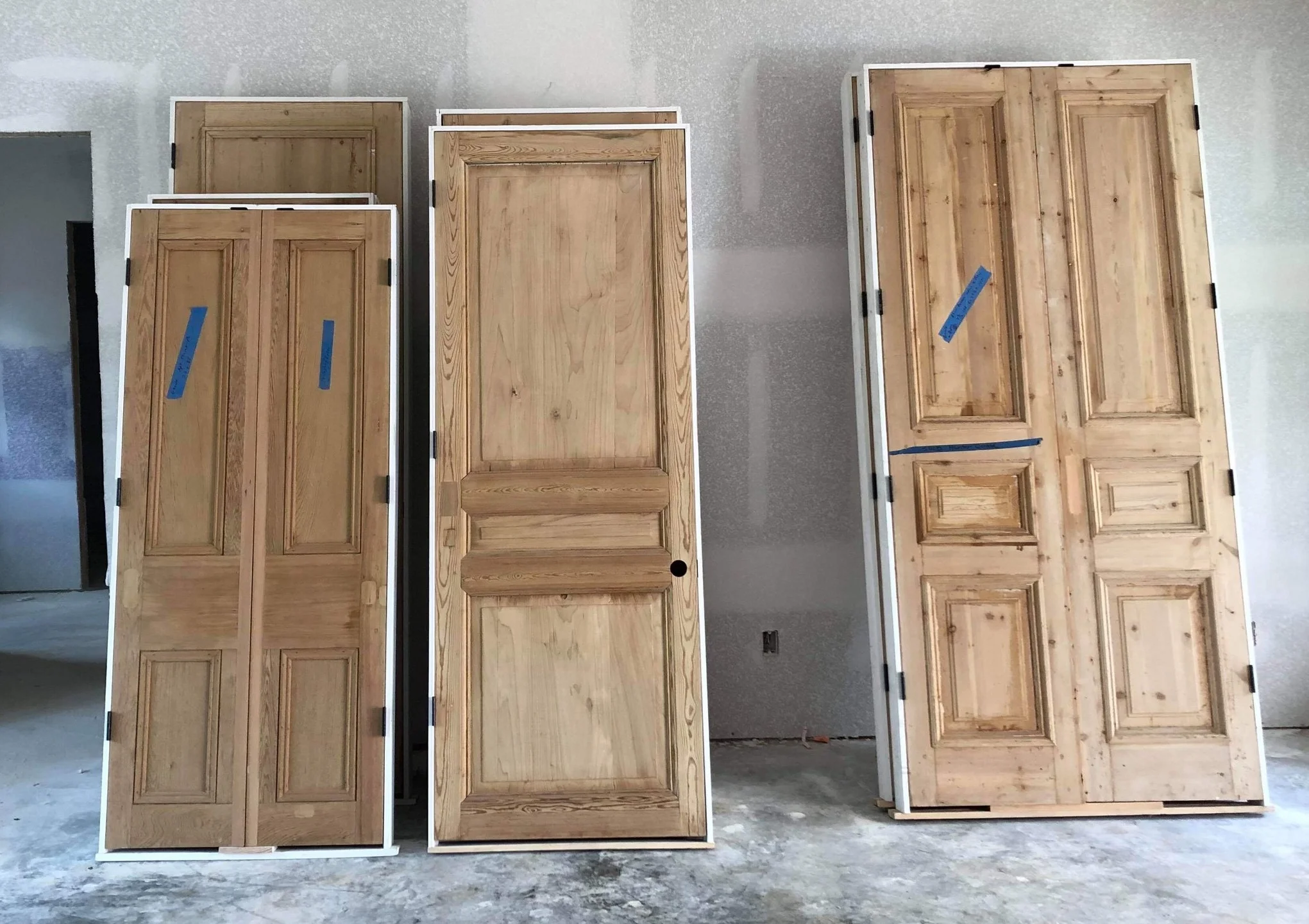 Doors placed in a jamb, ready to be installed.