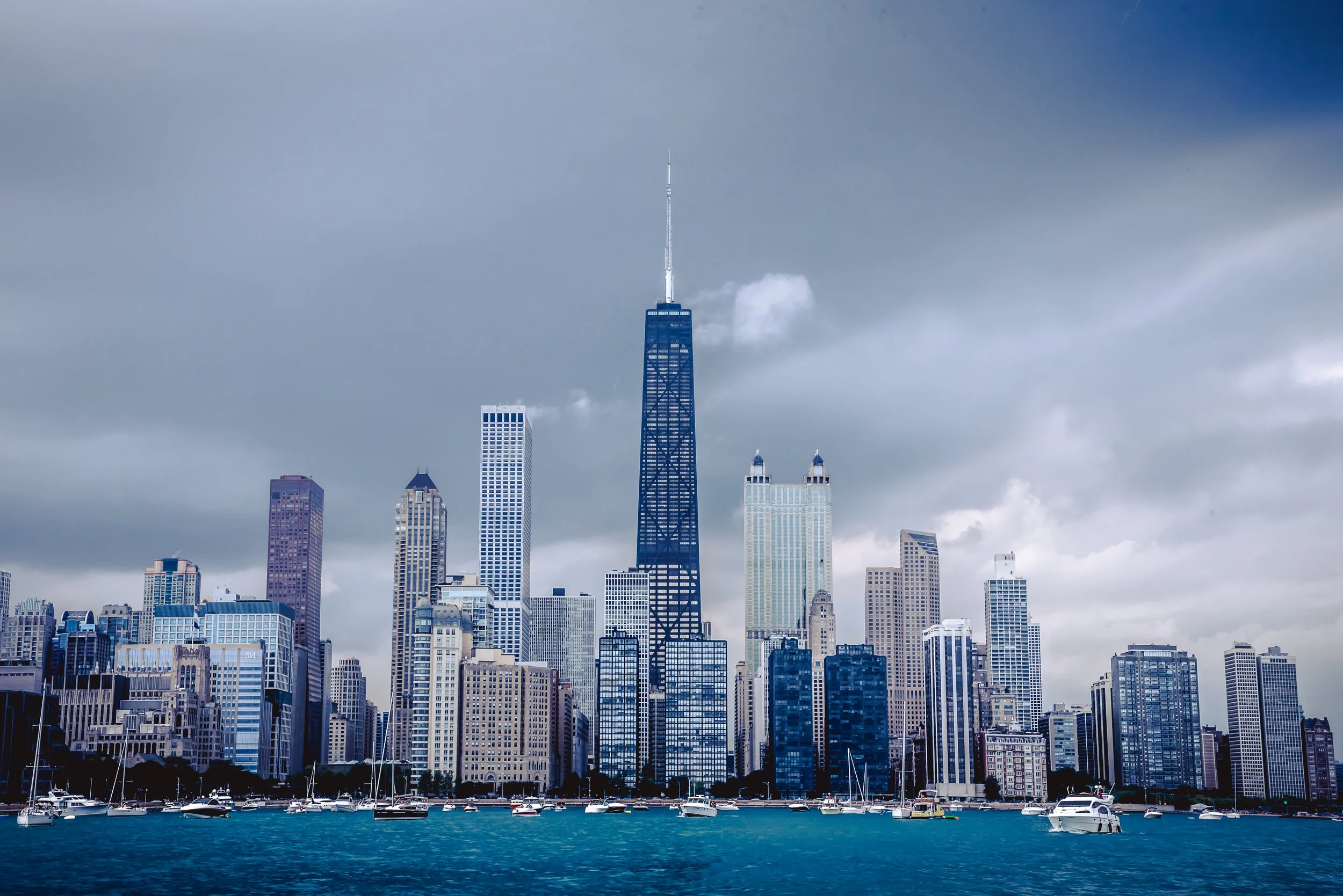 As the clouds roll in, lightning is dancing around the skyline. A reminder that you’re never too old to play in the rain.