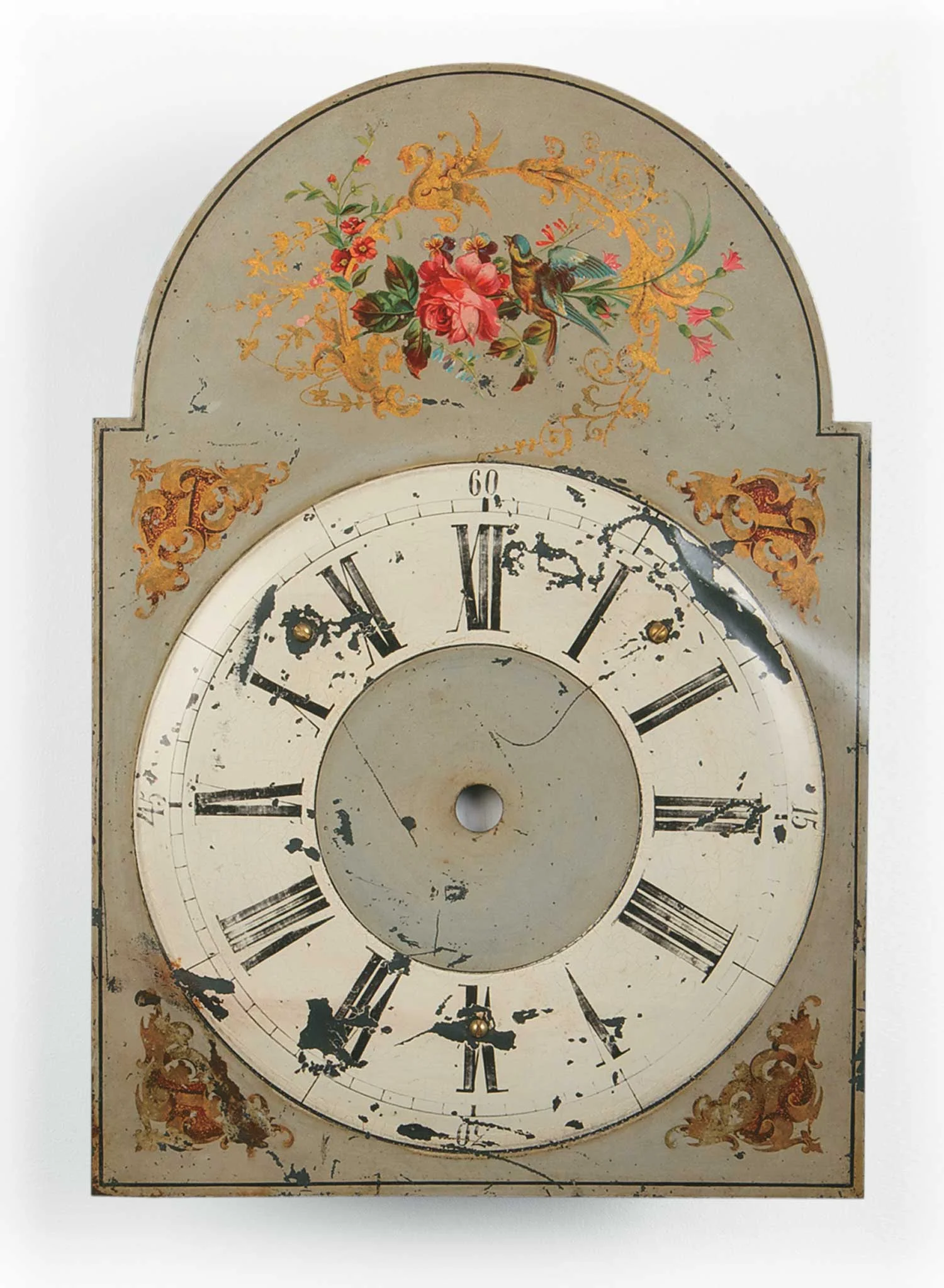 In post-revolutionary Russia, anarchists lead by Nestor Makhno raided Mennonite towns and villages, demanding food and shelter and often looting homes of everything valuable. According to the owners of this clock, the home of Peter Martens was taken over by Makhno to serve as his headquarters. When the clock started to chime, Makhno ripped it off the wall and stamped on it with his boot, leaving a permanent reminder of his terror. Loan courtesy of Mennonite Heritage Archives.
