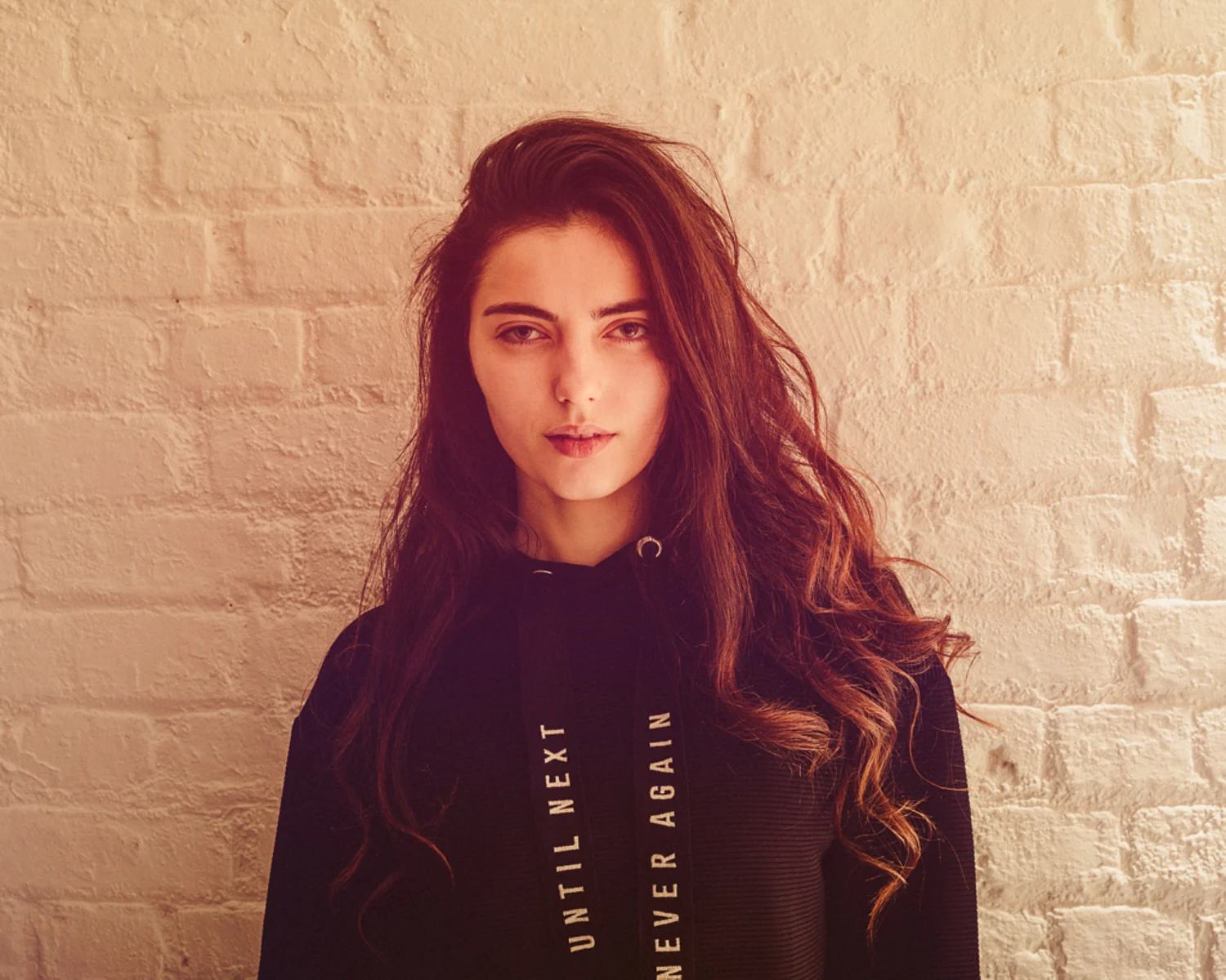 portrait photographer Tim Cole shoots man girl against wall