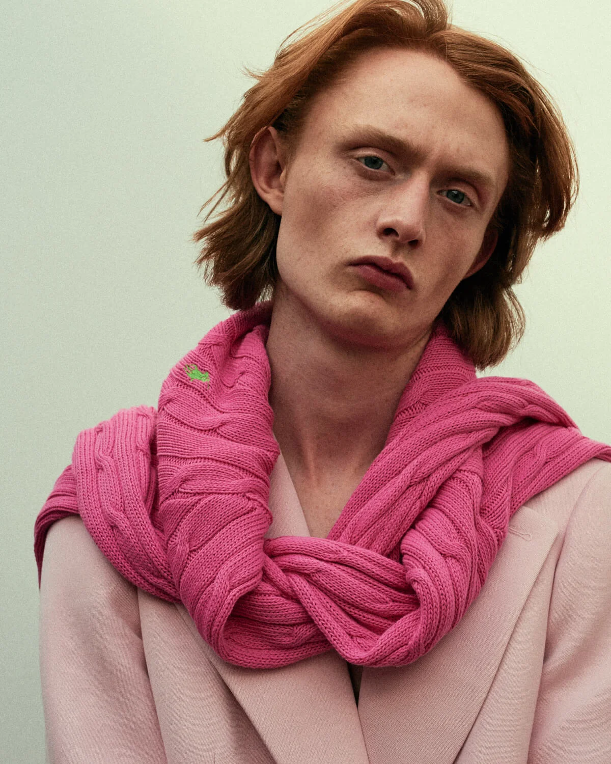 portrait photographer Tim Cole shoots man in pink jumper