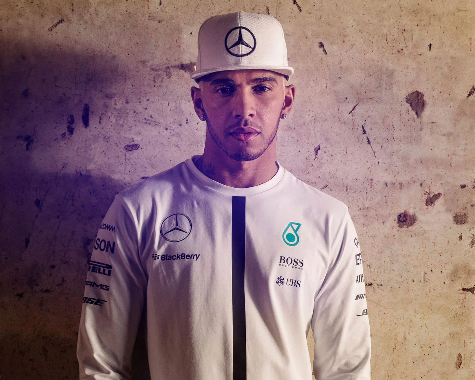 portrait photographer Tim Cole shoots Lewis Hamilton against a concrete wall