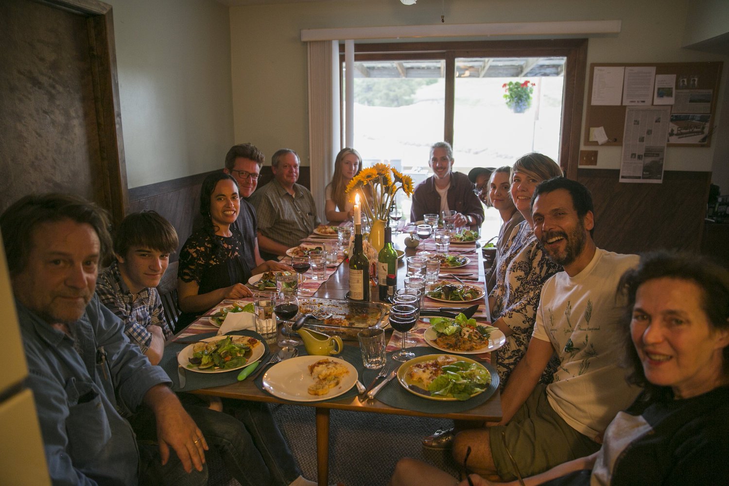  Artist, interns and family eating dinner at the Sandhills Institute Ranch Headquarters 