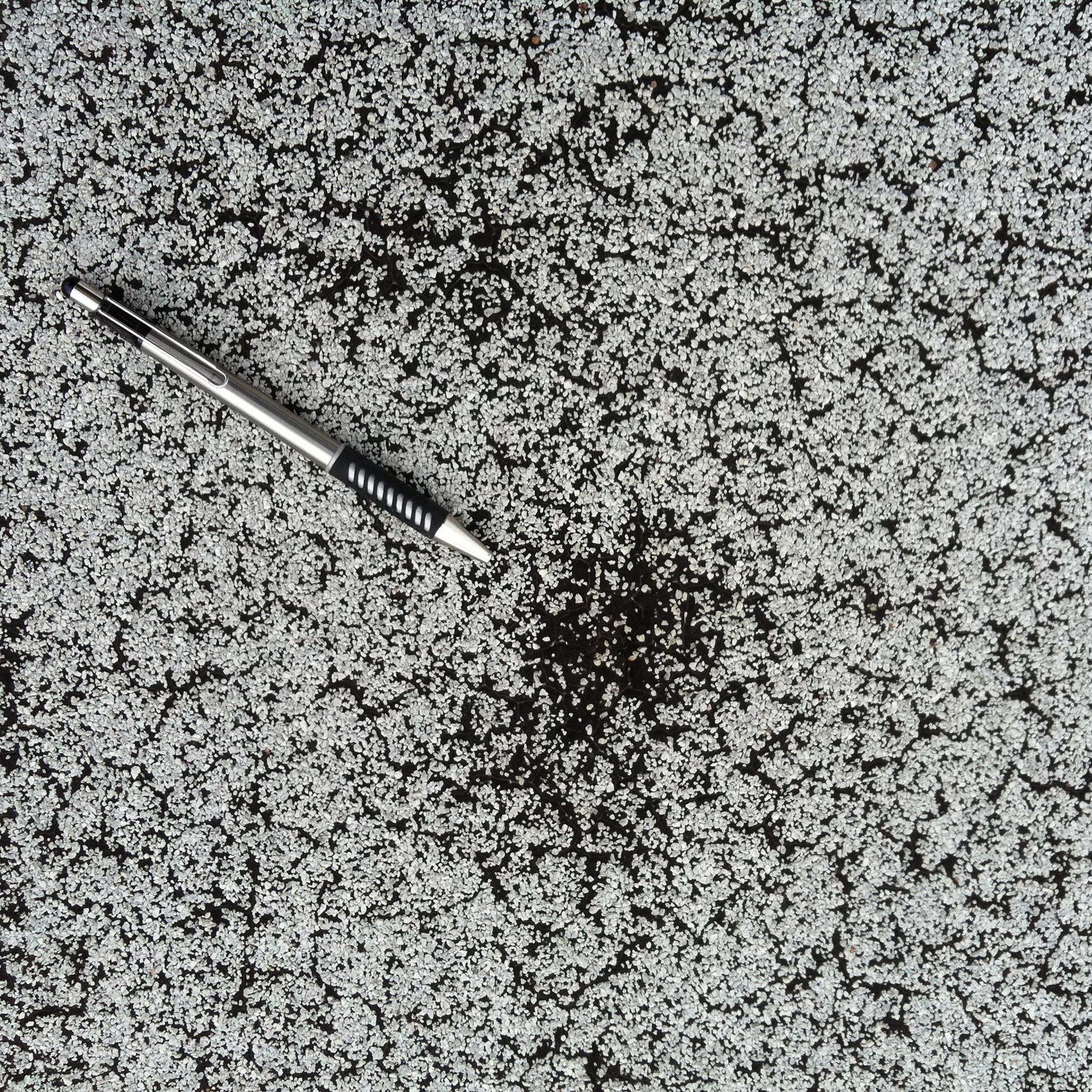 Hail+Damage+Modified+Bitumen+%28obvious+-+top+side%29.jpg