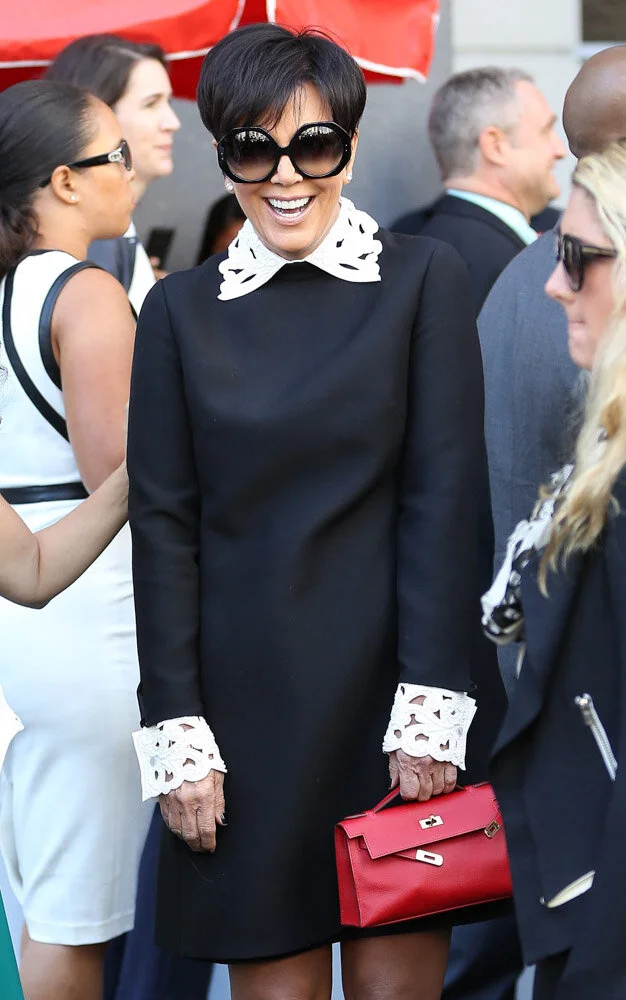 Kris Jenner with her Hermes Kelly Pochette