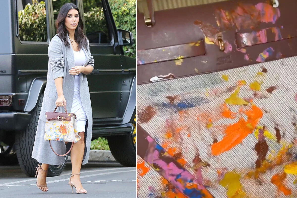 Kim Kardashian with her Hermes Her Bag Hand Painted by North West