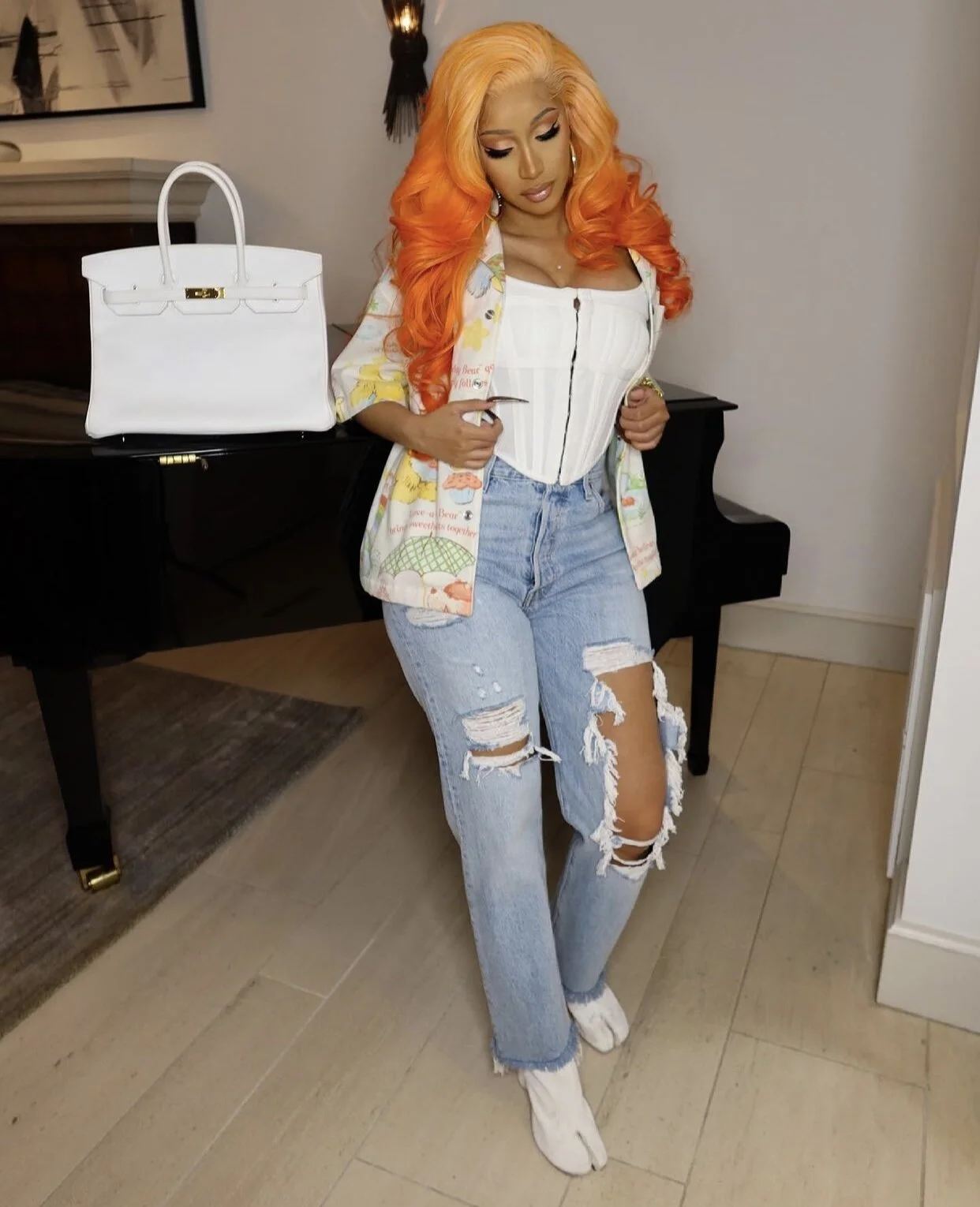 Cardi B with her New Hermès White Birkin 35