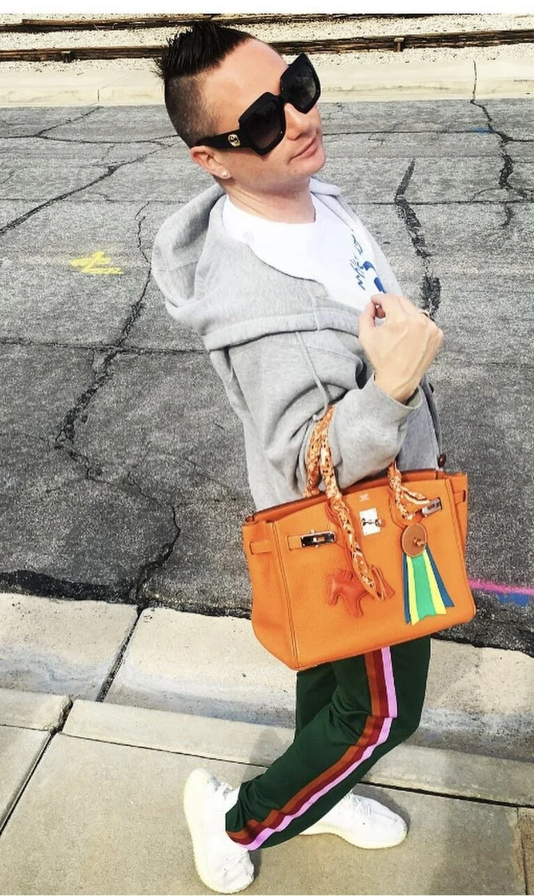 Michael Kuluva Carrying his Hermès Birkin 30 Orange on his Birthday