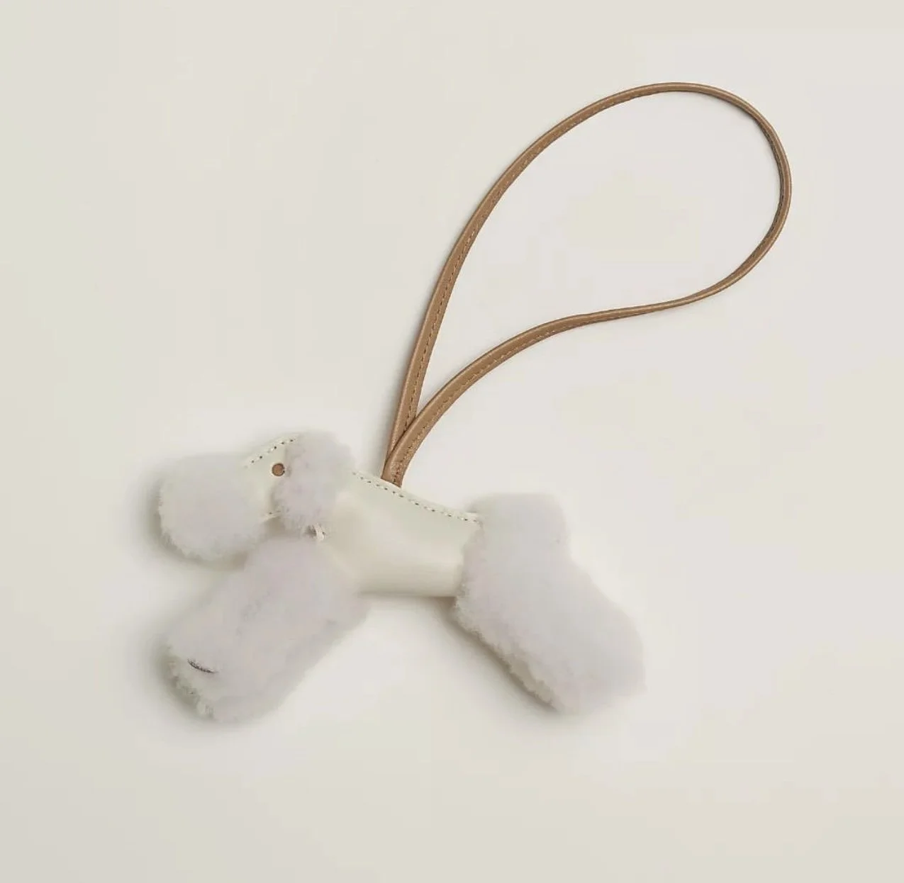 The New Hermes Buddy Charm in Craie