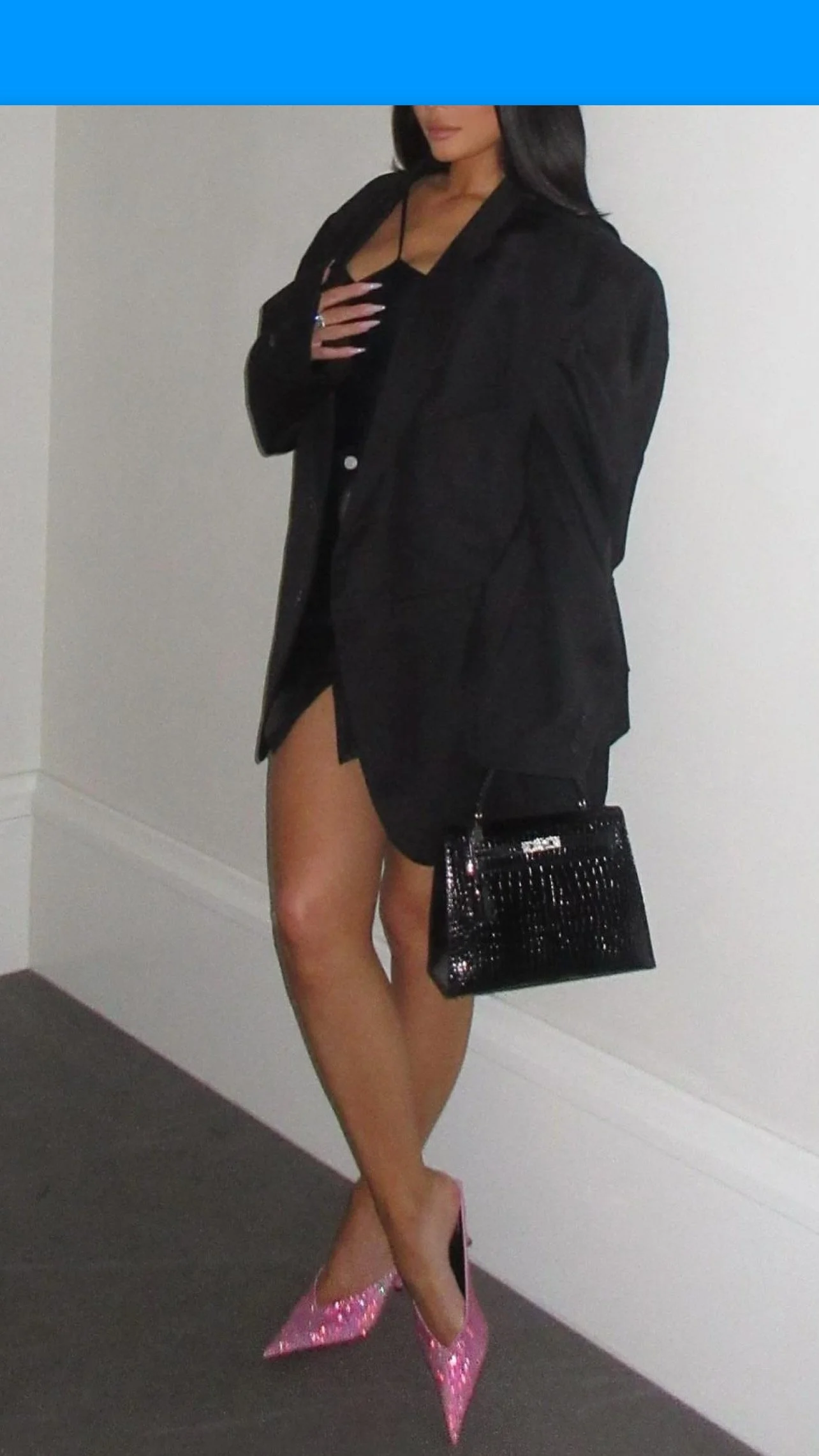 Kylie Jenner with her Hermes Exotic Diamond Kelly Bag