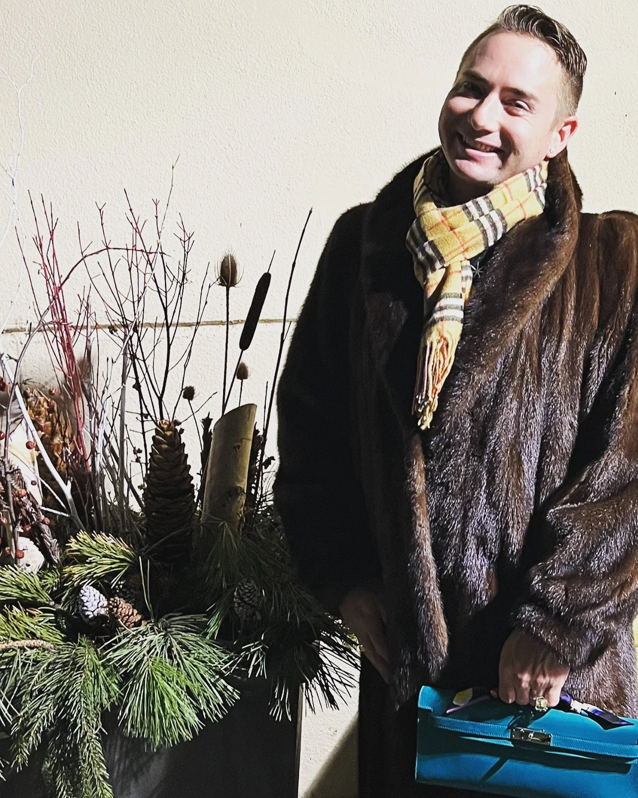 Michael KULUVA with his Hermes Kelly Cut Blue Paon Pochette