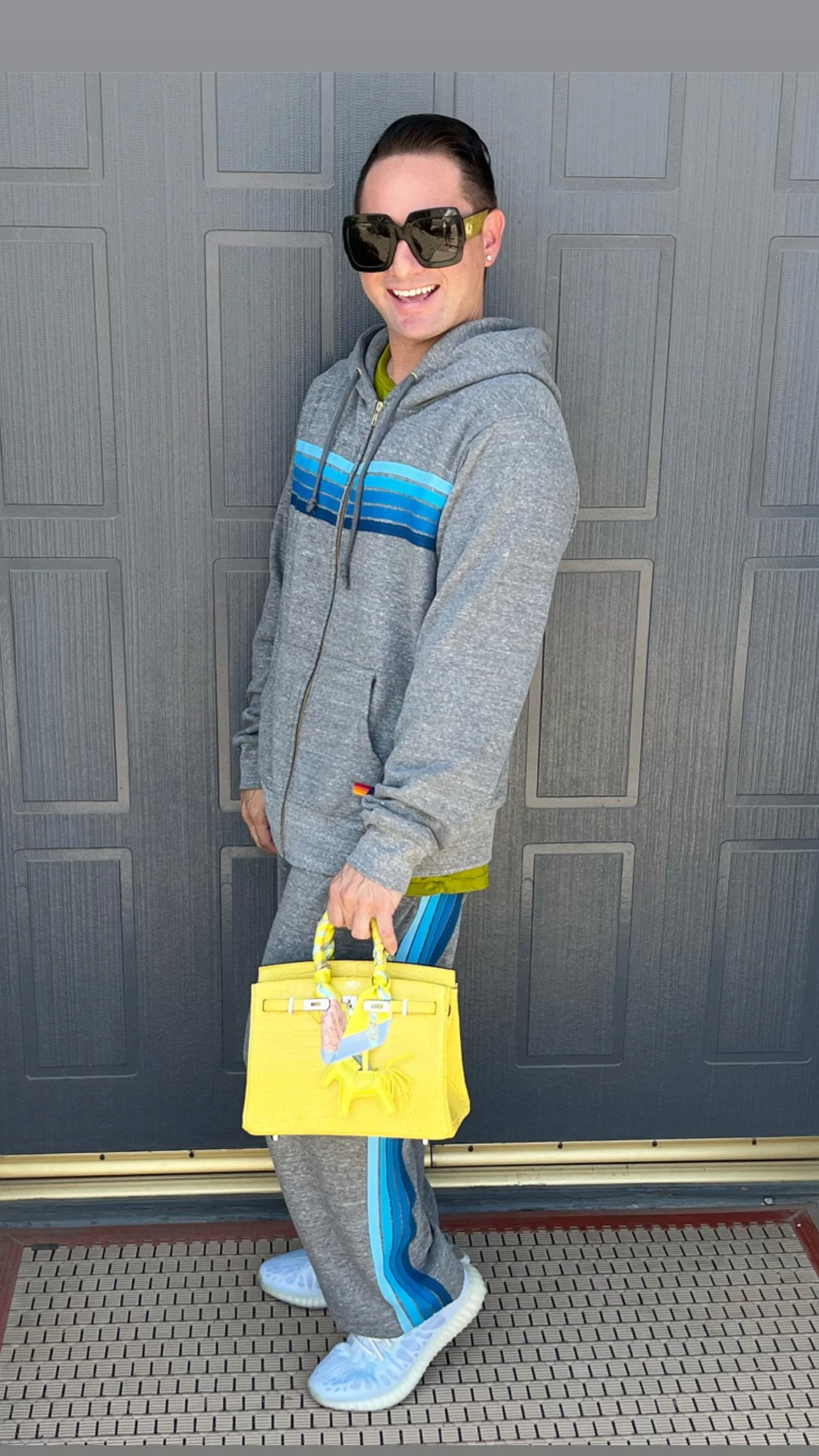 Michael Kuluva with his Hermes Exotic Birkin Bag