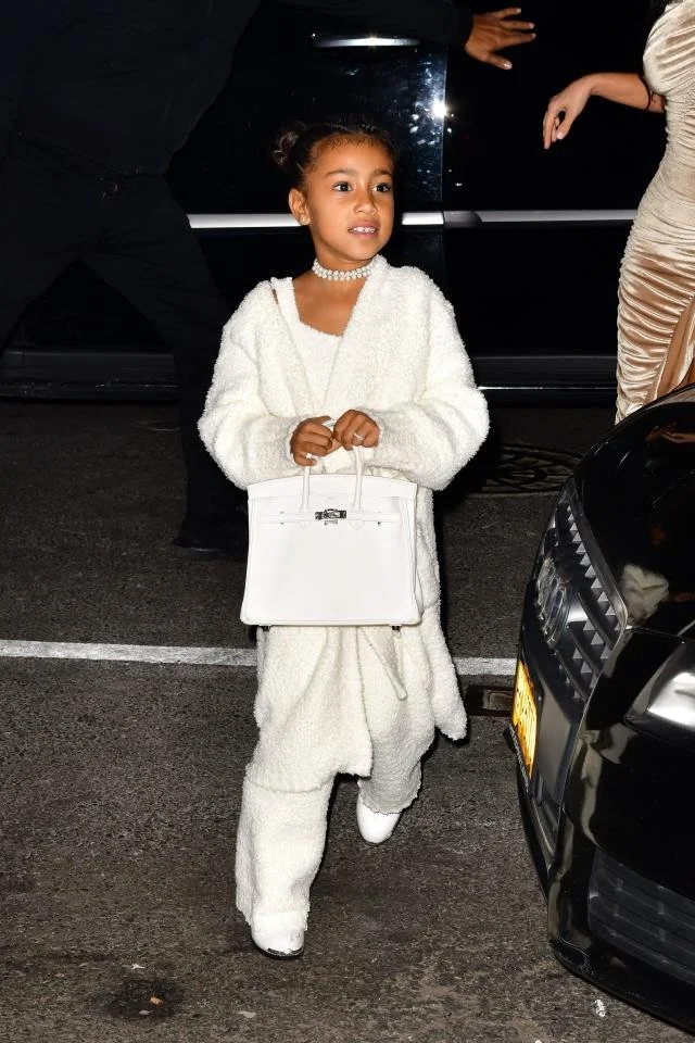 North West with her Hermes White Birkin Bag 