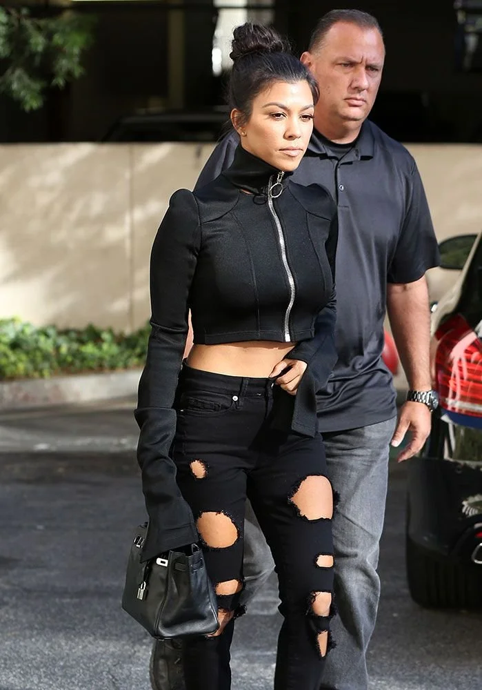 Kourtney Kardashian Barker with her Hermes Black Birkin Bag