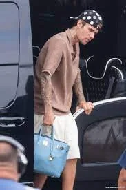 Justin Bieber with a Hermes Blue Birkin Bag