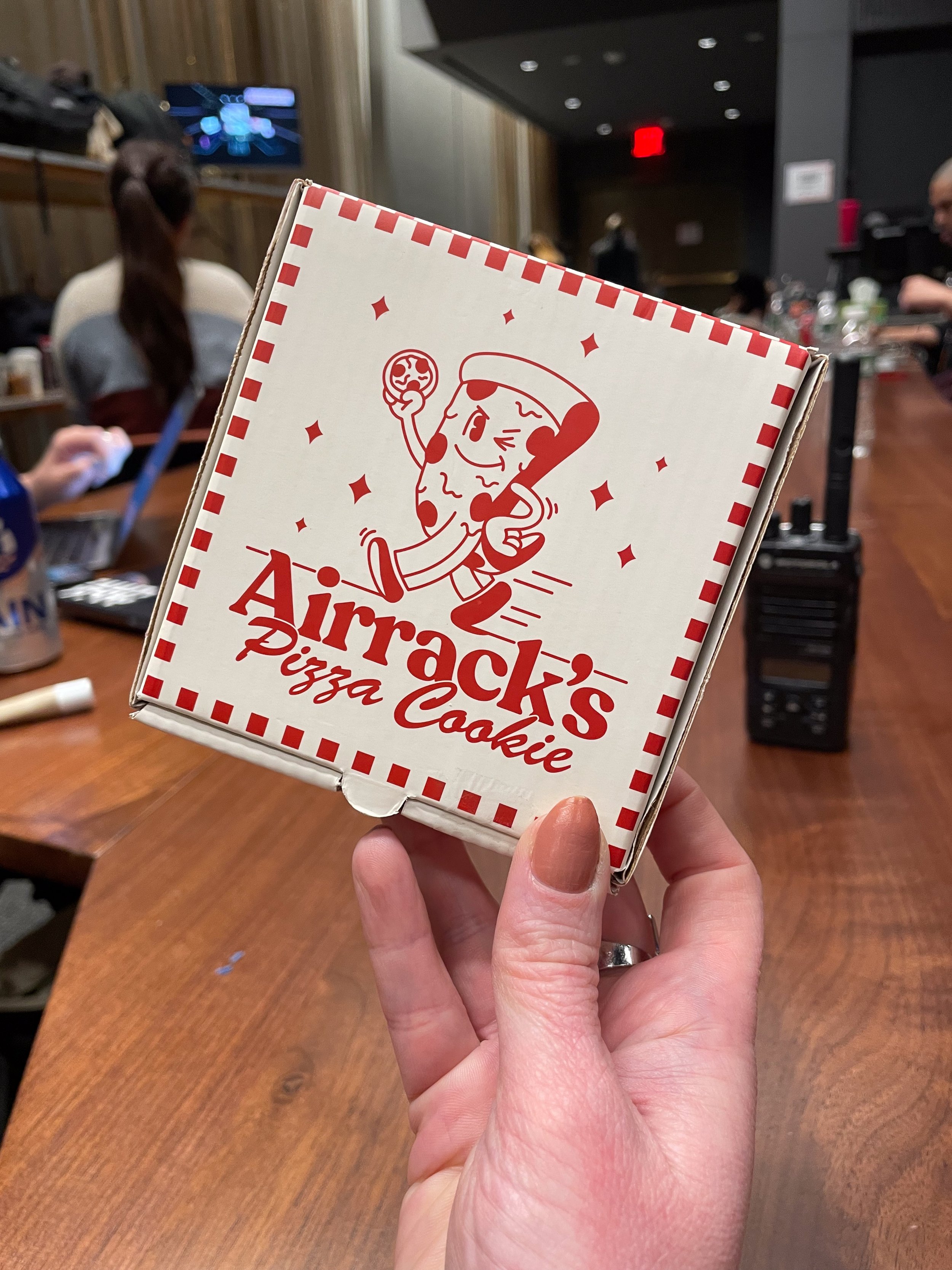  Show giveaways, like these pizza cookie boxes for YouTube creator Airrack, were whimsically designed to enhance guest experience and support his best known video challenge. 