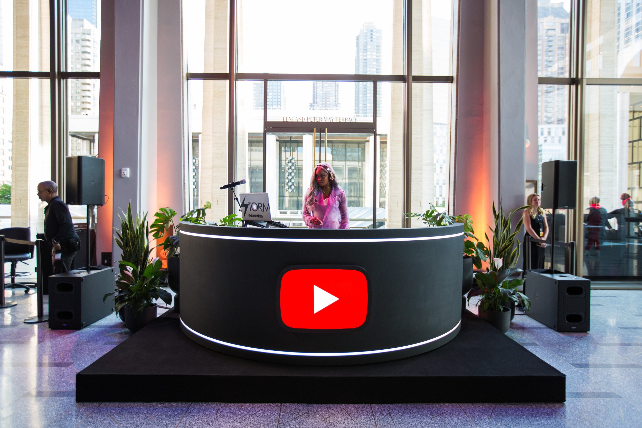  Along with designing and building a bespoke DJ booth, we also ensured the YouTube logo would be highly visible in any lighting (and correctly viewable, even in reflections!). 