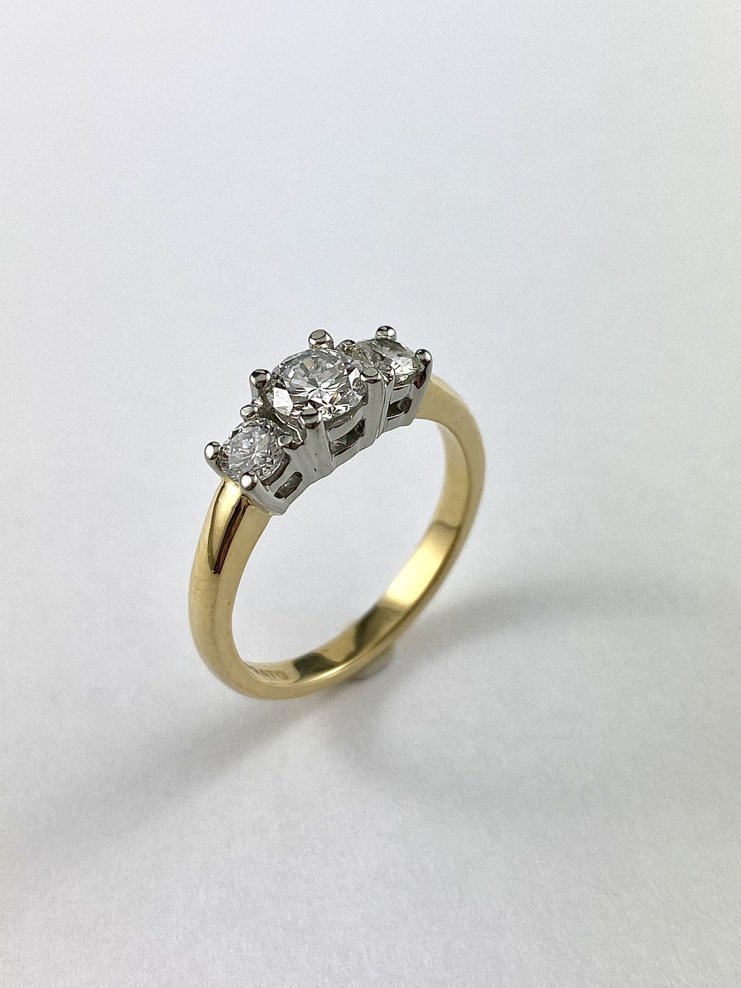 19K White and 18K Yellow Gold Three Diamond Ring