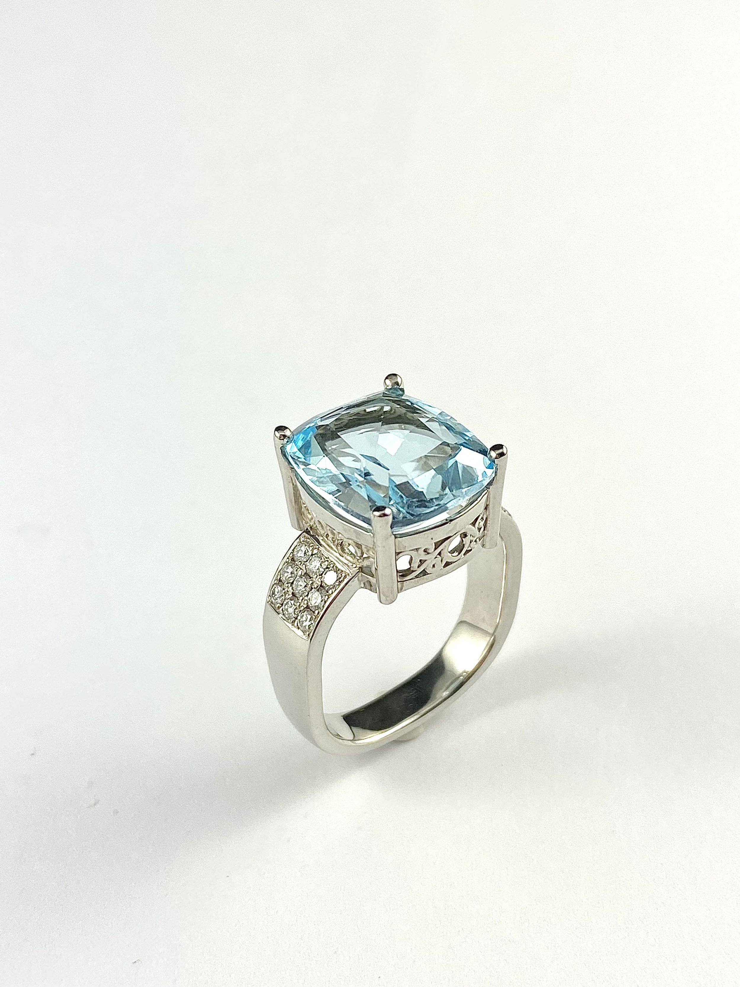 19K White Gold Blue Topaz and Diamond Ring
