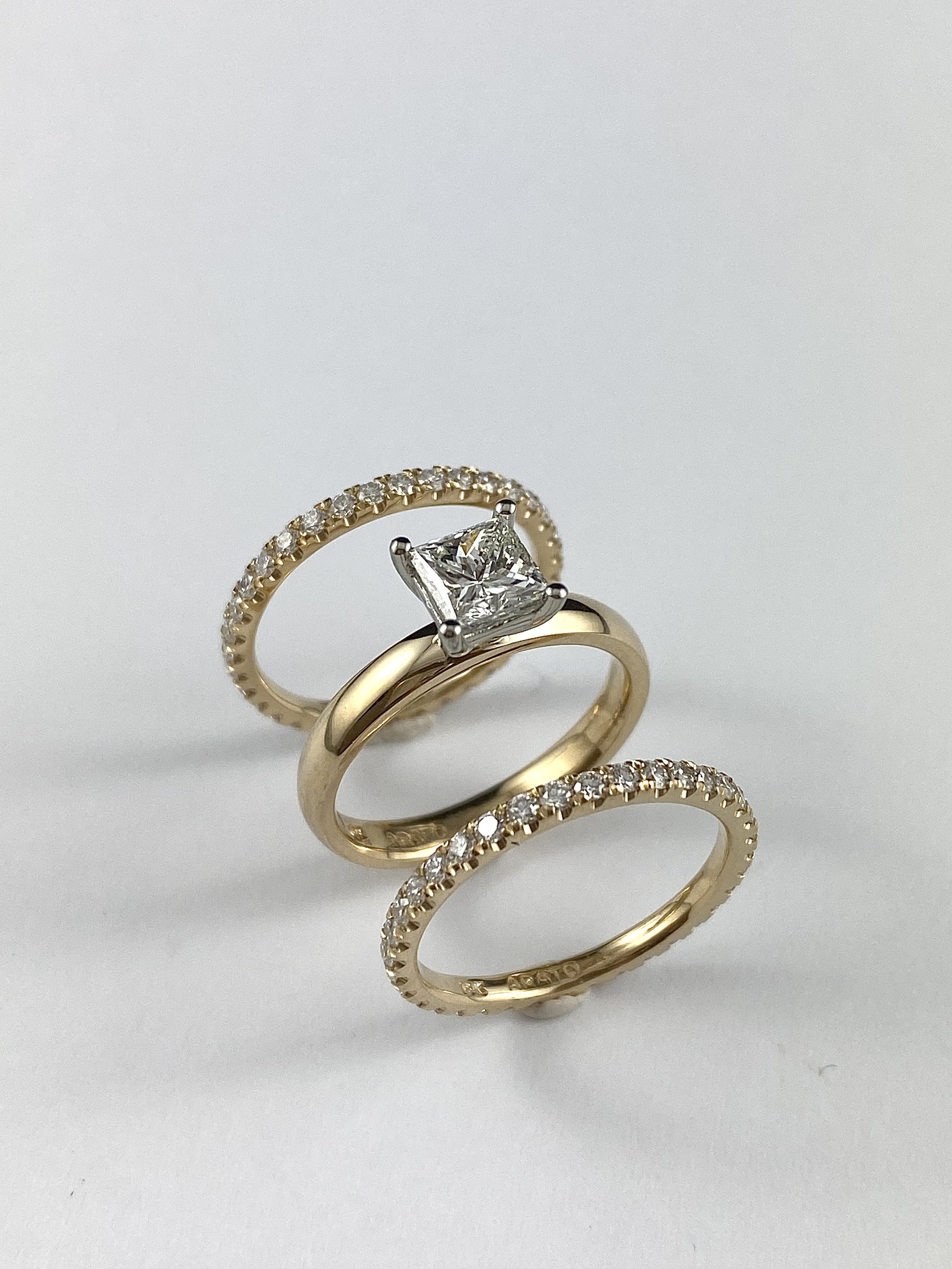 19K White and Yellow Gold Princess Cut Diamond Ring with 18K Yellow Gold Diamond Eternity Bands