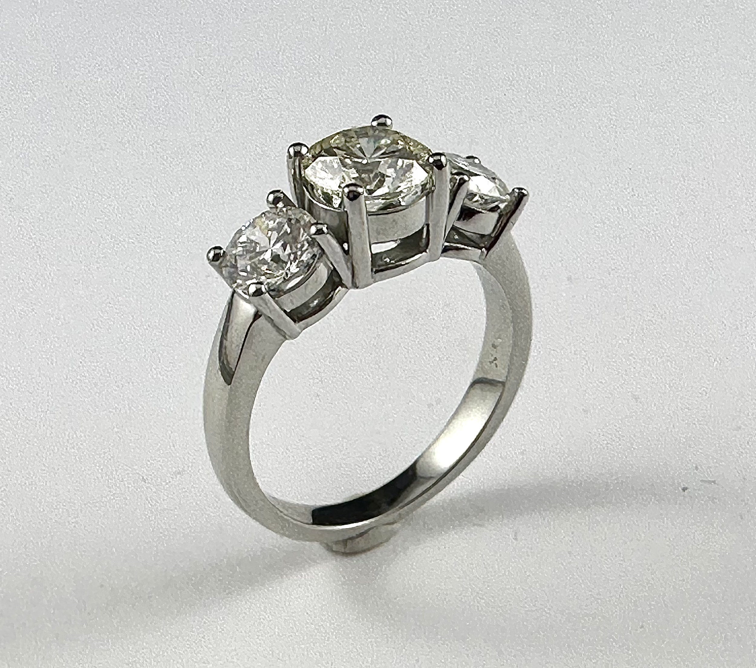 19K White Gold Three Diamond Ring