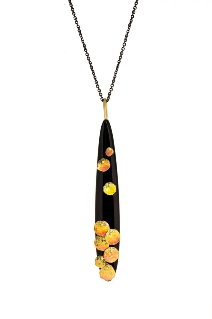 April Higashi, Furattā, 2015, 22k yellow gold, leaded enamel, black onyx, steel chain, 2 7⁄8”Pendant, 33" steel chain, photo: Shibumi Gallery