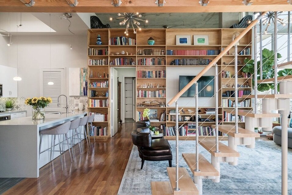 Living Room with Ceiling High Bookshelves 