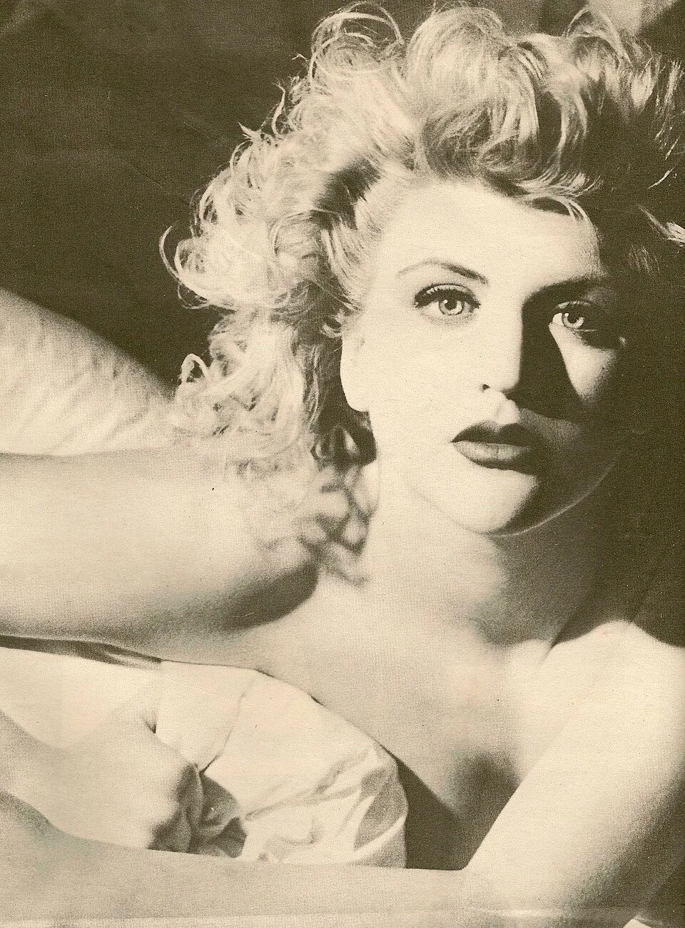 Courtney Love publicity portrait (1986) — photo by unknown photographer, via Wikimedia Commons, licensed under CC BY-SA